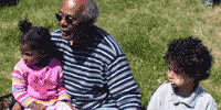 Photo of Eddie with one of his Grandsons -- and his friend